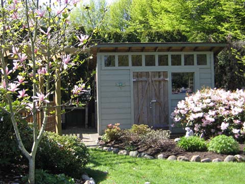 Our friend Janet built this rustic garden shed in her backyard.